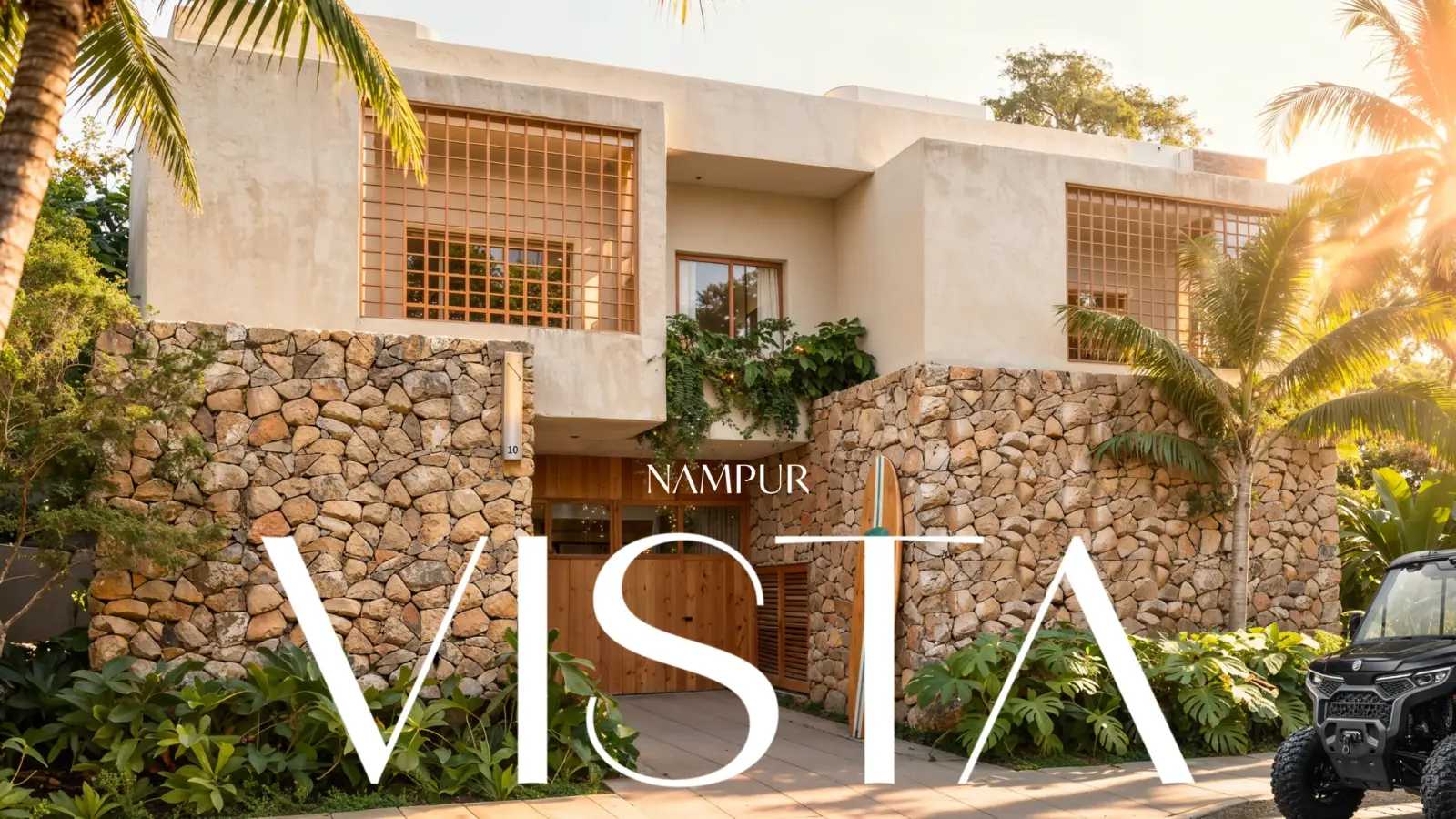 VISTA's façade in stone and brick latticework, with the Nampur Vista wordmark over the image