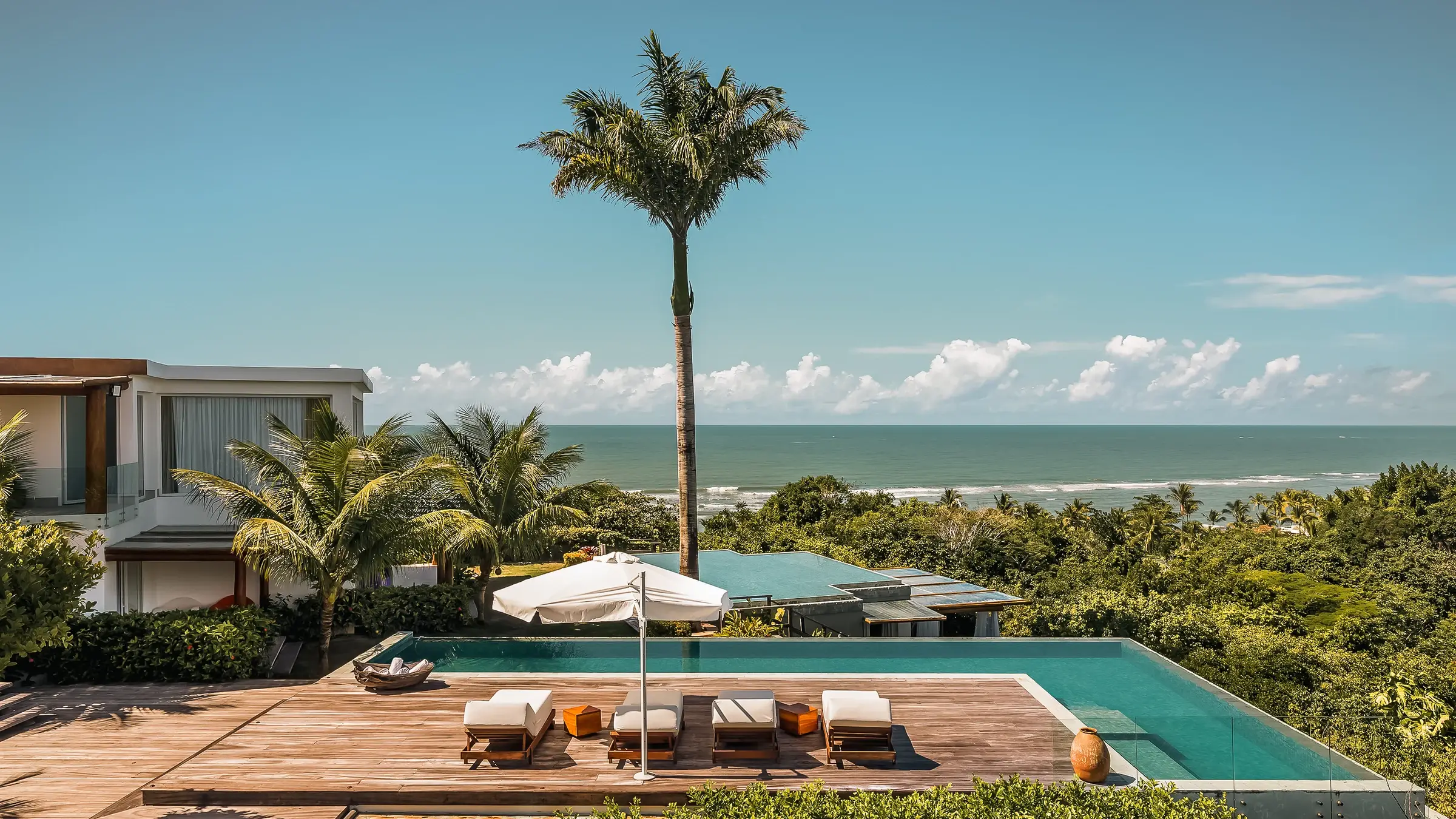 Villa Greda pool and deck with loungers and the sea behind