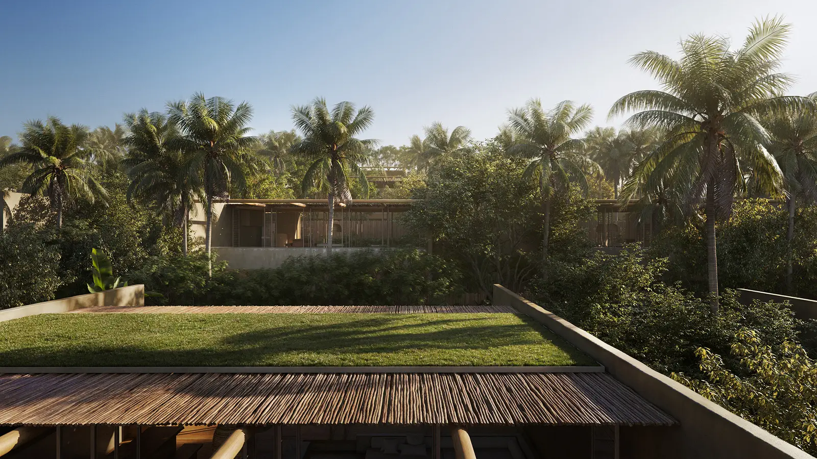 Casas de praia de alto padrão em Trancoso e Arraial d'Ajuda apresentam arquitetura moderna com rooftop sustentável e detalhes em bambu, envoltas por vegetação exuberante e palmeiras sob um céu azul.